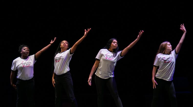 Participants move onstage in the 2022 Playmaking for Girls annual public performance. Photo: Courtesy of Synchronicity Theatre / Casey Gardner Ford