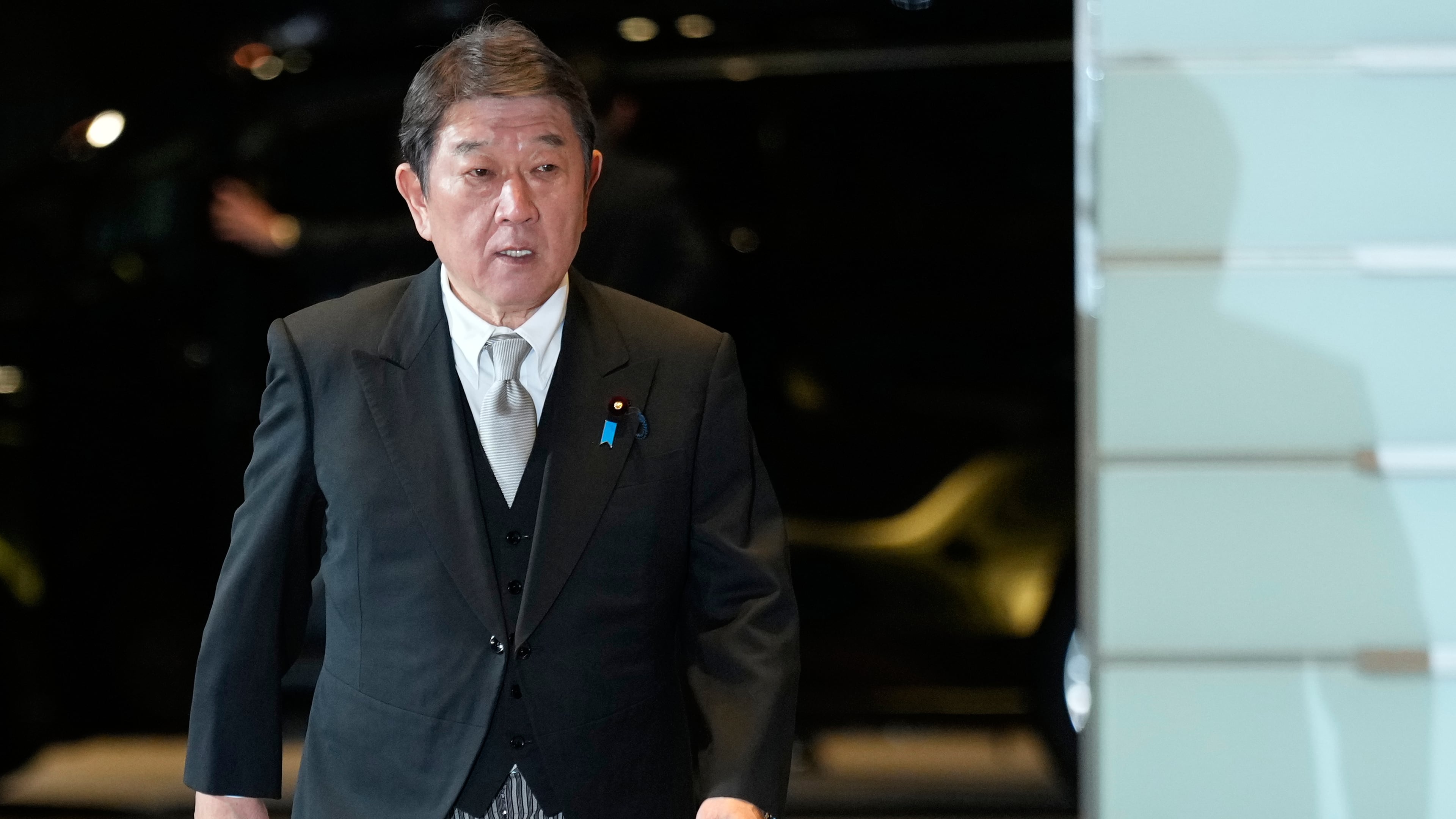 Toshimitsu Motegi, newly appointed foreign minister, arrives at the prime minister's office in Tokyo, Japan, Tuesday, Oct. 21, 2025.(AP Photo/Eugene Hoshiko)