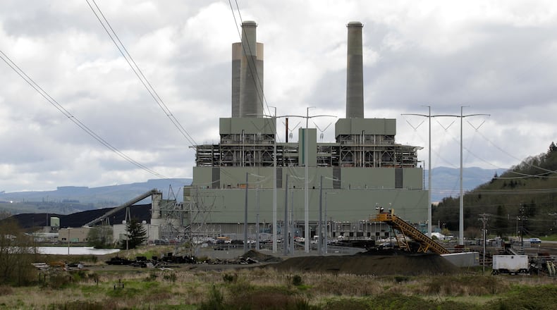 FILE - The coal-burning TransAlta power plant is shown near Centralia, Wash., April 29, 2011. (AP Photo/Ted S. Warren, File)