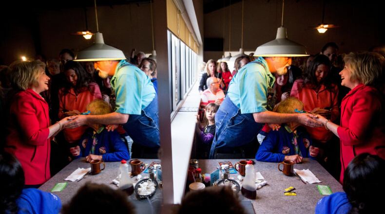 Hillary Clinton greets patrons at the Lone Oak Little Castle restaurant in Paducah, Ky., on Monday. (AP Photo/Andrew Harnik)