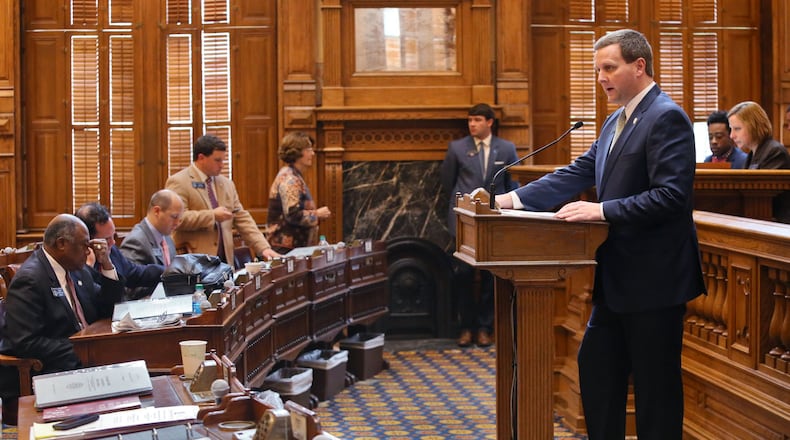 Senator Charlie Bethel (left), District 54, speaks in favor of his Senate Bill 1, which requires insurance companies to provide coverage for autism-related disorders. BOB ANDRES / BANDRES@AJC.COM