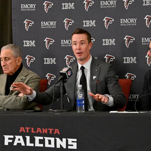 New Atlanta Falcons president of football Matt Ryan (center) speaks as Atlanta Falcons owner Arthur M. Blank (left) and CEO Greg Beadles sit next him during a news conference to introduce new Falcons president of football Matt Ryan, Tuesday, Jan. 13, 2026, in Flowery Branch. (Hyosub Shin/AJC)