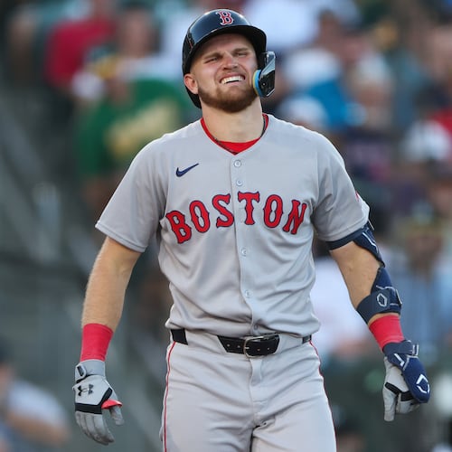 Boston Red Sox's Curtis Mead reacts after being hit by a pitch during the fourth inning of a baseball game against the Athletics, Monday, July 27, 2026, in West Sacramento, Calif. (AP Photo/Scott Marshall)