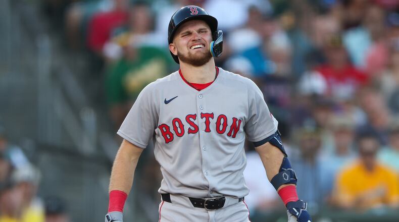 Boston Red Sox's Curtis Mead reacts after being hit by a pitch during the fourth inning of a baseball game against the Athletics, Monday, July 27, 2026, in West Sacramento, Calif. (AP Photo/Scott Marshall)