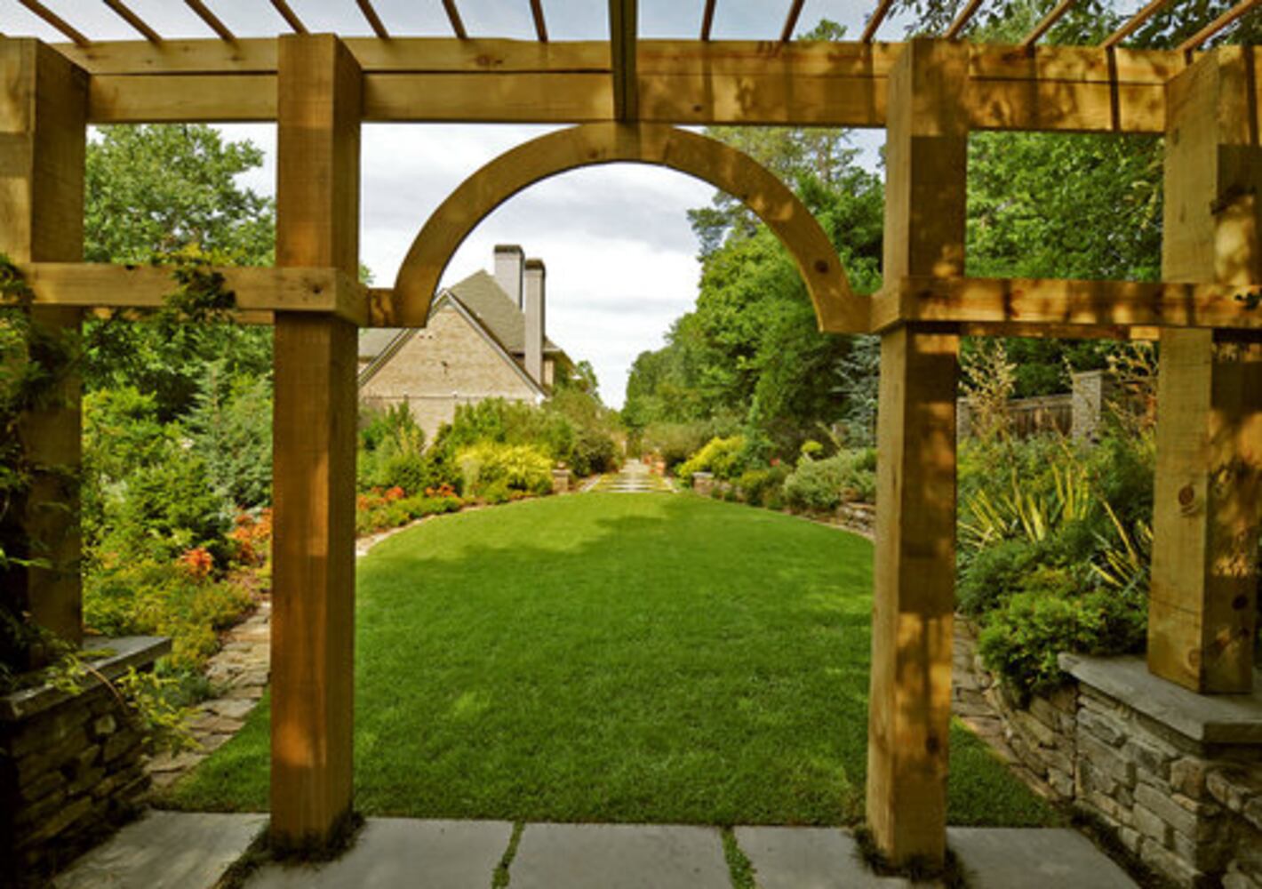 A wooded Druid Hills garden planted with TLC