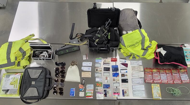 The Paulding County Sheriff's Office recovered many stolen items taken from unlocked cars, including credit cards and driver's licenses, when executing a search warrant at a Dallas home.
