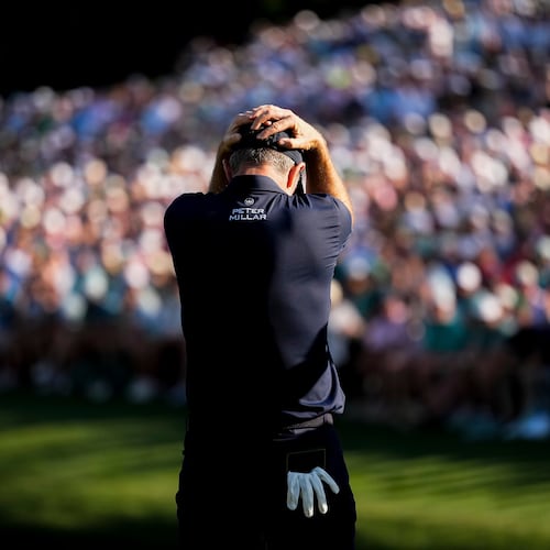 Justin Rose, of England, reacts after missing a putt on the 16th hole during the final round of the Masters golf tournament at the Augusta National Golf Club, Sunday, April 12, 2026, in Augusta, Ga. (AP Photo/Gerald Herbert)