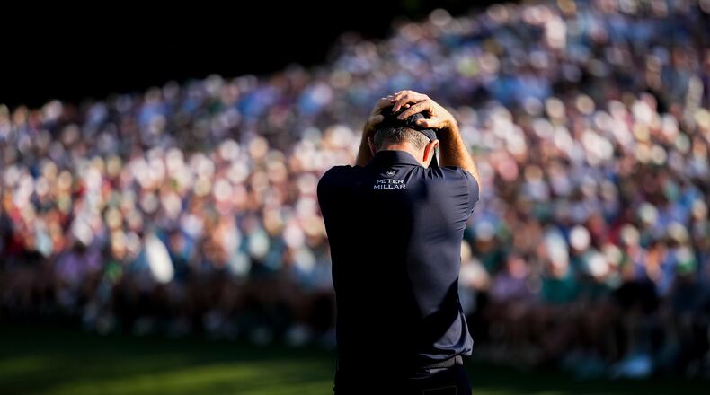 Justin Rose, of England, reacts after missing a putt on the 16th hole during the final round of the Masters golf tournament at the Augusta National Golf Club, Sunday, April 12, 2026, in Augusta, Ga. (AP Photo/Gerald Herbert)