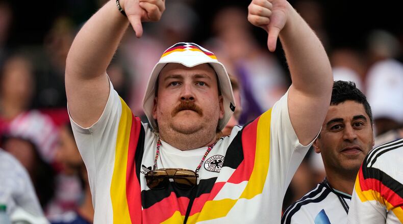 A Germany fan reacts at the end of the World Cup round of 32 soccer match between Germany and Paraguay in Foxborough, Mass., near Boston, Monday, June 29, 2026. (AP Photo/Charles Krupa)
