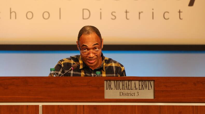 DeKalb County Board of Education Chairman Michael Erwin speaks at the school board meeting in Stone Mountain on Feb. 13. EMILY HANEY / EMILY.HANEY@AJC.COM