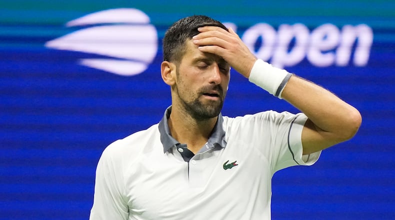 Novak Djokovic, of Serbia, reacts during the first round of the U.S. Open tennis championships against Mariano Navone, of Argentina, Sunday, Aug. 30, 2026, in New York. (AP Photo/Frank Franklin II)