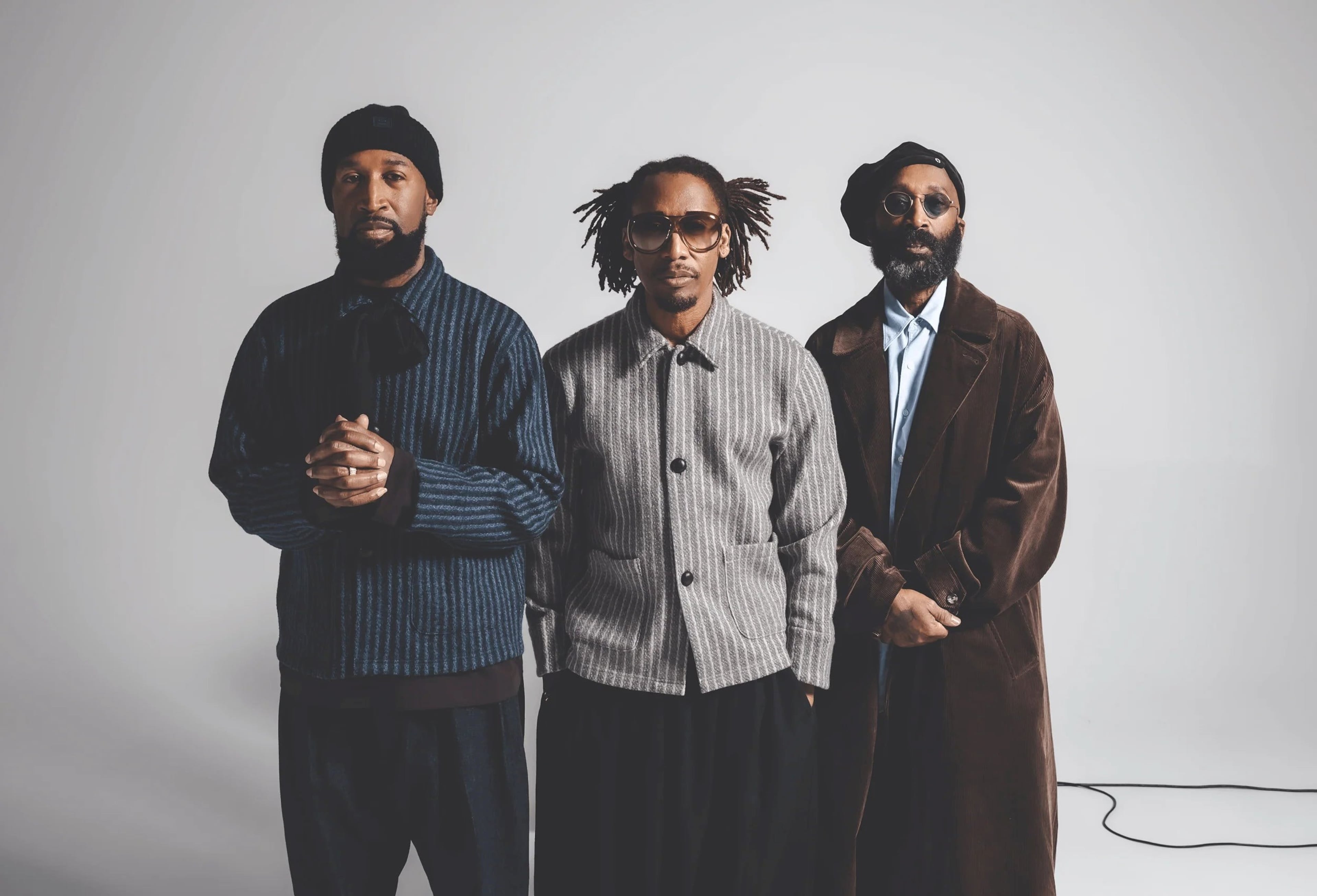 Oakland-bred trio Tony! Toni! Tone! (from left to right): Timothy Christian Riley, Raphael Saadiq, and D'Wayne Wiggins performed their first tour in 25 years in 2023, stopping at Atlanta's Fox Theatre. Wiggins died from bladder cancer in 2025. (Courtesy of David “Odiwams” Wright)