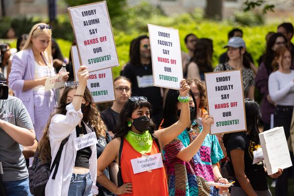 Faculty and staff demonstrate at Emory University in Atlanta on Monday.