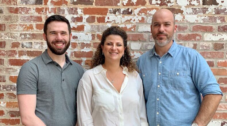 Carmel partners Joshua Riddle (left), Tal Baum (center) and Brandon Hughes.