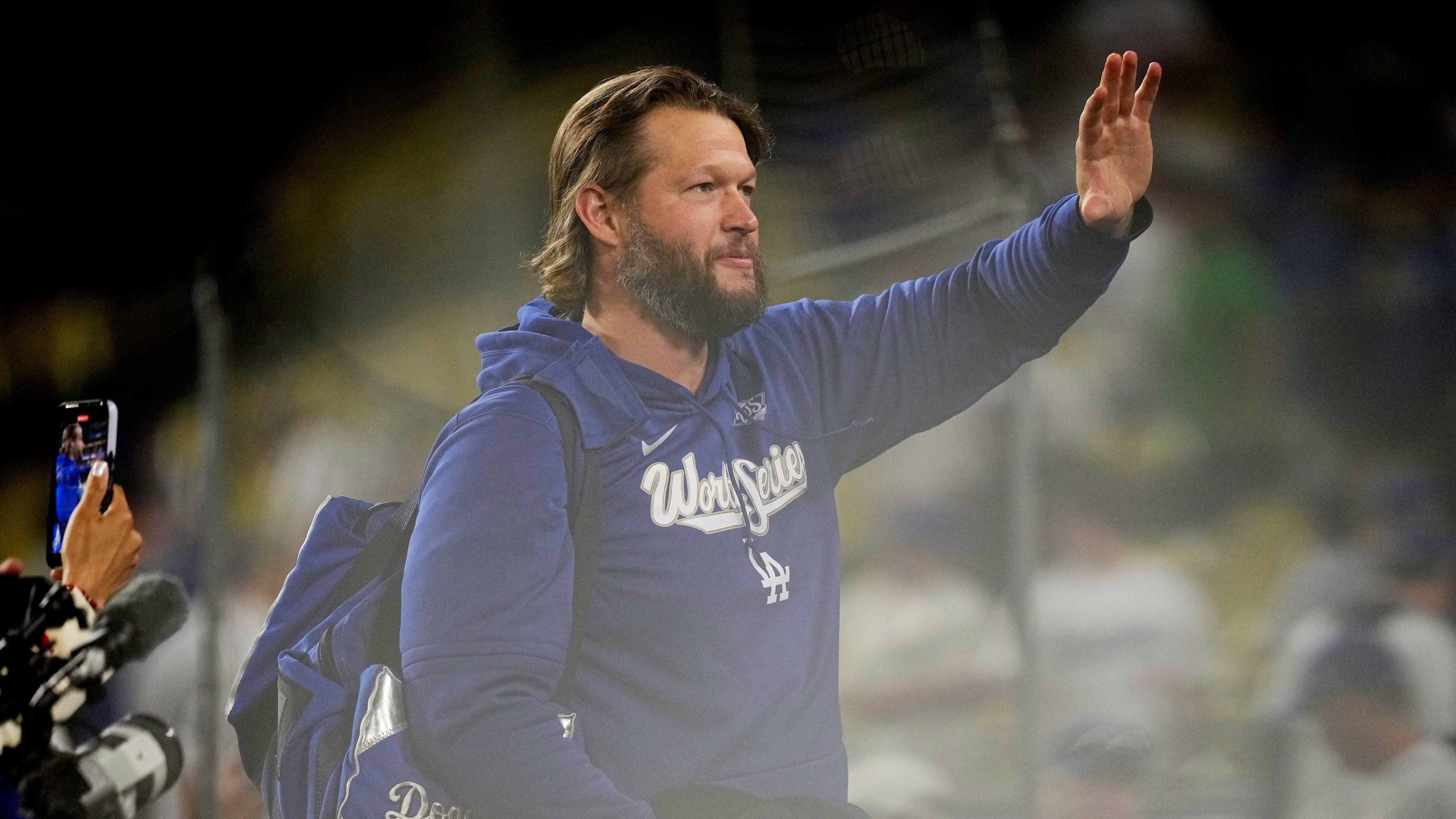 Los Angeles Dodgers pitcher Clayton Kershaw waves after their loss against the Toronto Blue Jays in Game 5 of baseball's World Series, Wednesday, Oct. 29, 2025, in Los Angeles. (AP Photo/Brynn Anderson)