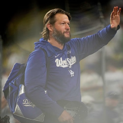 Los Angeles Dodgers pitcher Clayton Kershaw waves after their loss against the Toronto Blue Jays in Game 5 of baseball's World Series, Wednesday, Oct. 29, 2025, in Los Angeles. (AP Photo/Brynn Anderson)