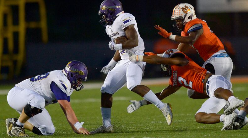 East Coweta running back Jayland Rivers (3) carries the ball for yardage during a 2019 playoff game at North Cobb. East Coweta will face Parkview this week, trying to advance to the state quarterfinals for the first time since 2002. (Daniel Varnado/Special)