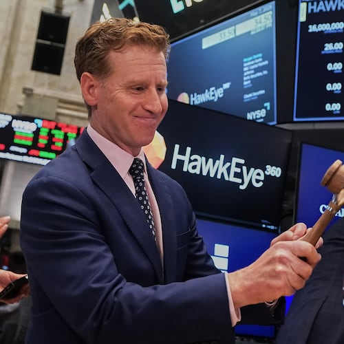 HawkEye 360 CEO John Serafini rings a ceremonial bell on the floor of the New York Stock Exchange as his company's IPO begins trading, Thursday, May 7, 2026. (AP Photo/Richard Drew)