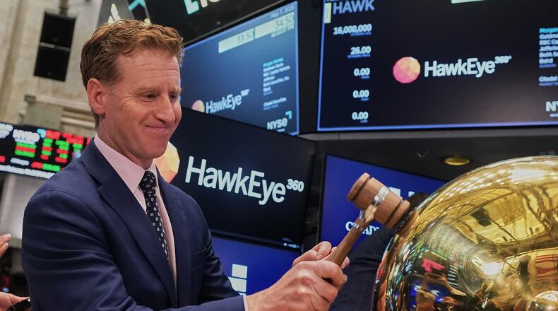 HawkEye 360 CEO John Serafini rings a ceremonial bell on the floor of the New York Stock Exchange as his company's IPO begins trading, Thursday, May 7, 2026. (AP Photo/Richard Drew)