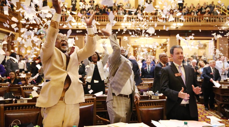 4/2/19 - Atlanta-  Representative throw paper in the air to celebrate the end of the legislature at the Georgia State Capitol in Atlanta, Georgia on Tuesday, April 2, 2019. Today is sine die day, the final day of the 2019 legislature. EMILY HANEY / emily.haney@ajc.com