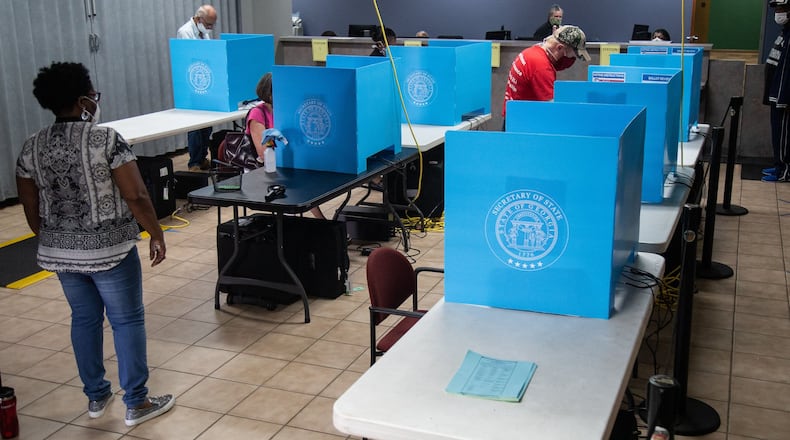 Michael Hanson votes last month at the DeKalb County Voter Registration and Elections Office near Decatur. STEVE SCHAEFER FOR THE ATLANTA JOURNAL-CONSTITUTION
