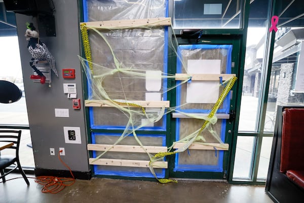 Police said a regular customer opened fire outside over an unpaid bill. (Miguel Martinez/ AJC)