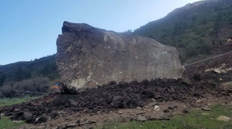 I giant boulder as big as a house is blocking a highway in southwest Colorado after crashing down from a rock ledge on Friday.