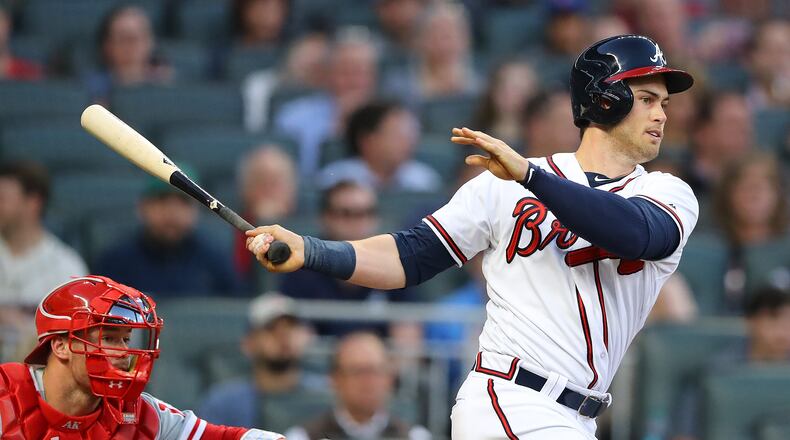 April 17, 2018 Atlanta: Braves outfielder Preston Tucker hits a RBI single to score Ender Inciarte for a 1-0 lead over the Phillies during the first inning in a MLB baseball game on Tuesday, April 17, 2018, in Atlanta. Curtis Compton/ccompton@ajc.com