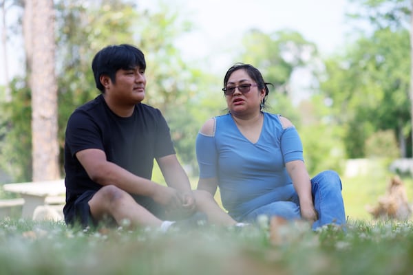 Cairo resident Sebastiana Gomez-Perez speaks with her son, a US citizen, Juan Carlos Lopez-Gomez, about how the community rallied in his support, which contributed to his release after being wrongfully detained as an "unauthorized alien." (Miguel Martinez/AJC)
