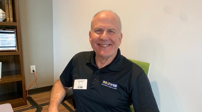 Scott Slade, the morning host for WSB, helped come up with the entire Care-a-thon idea and was there to announce the final total July 30, 2021. RODNEY HO/rho@ajc.com