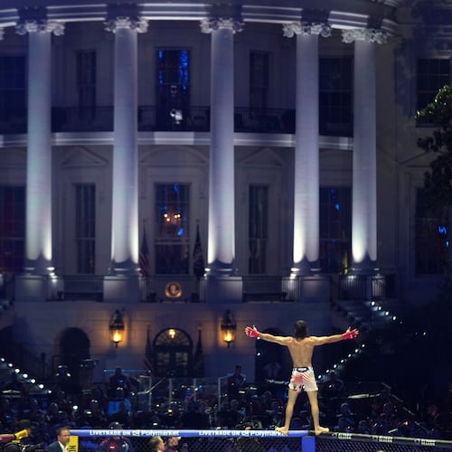 Diego Lopes celebrates during a featherweight bout against Steve Garcia during UFC Freedom 250 on the South Lawn of the White House, Sunday, June 14, 2026, in Washington. (AP Photo/Mark Schiefelbein)