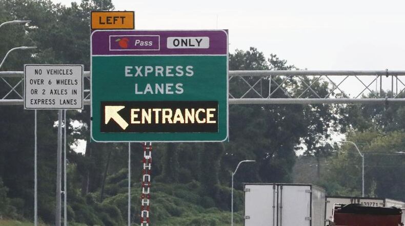 The Northwest Corridor Express Lanes on I-75 and I-575 in Cobb and Cherokee counties are operated using the Peach Pass, which warned against scam text messages demanding payment for toll fees. AJC FILE
