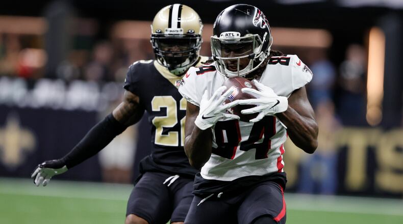 Atlanta Falcons running back Cordarrelle Patterson (84) makes the catch against New Orleans Saints defensive back Chauncey Gardner-Johnson (22) during the first half of an NFL football game, Sunday, Nov. 7, 2021, in New Orleans. (AP Photo/Butch Dill)