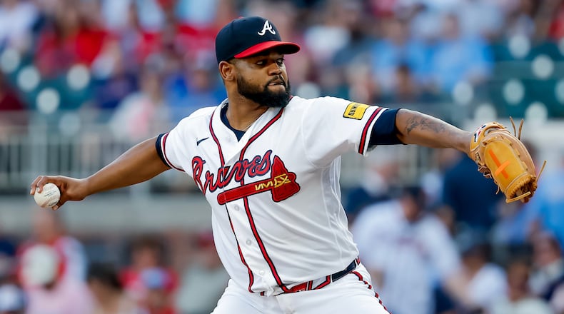 Atlanta Braves pitcher Reynaldo López delivers to a San Diego Padres batter during the first inning of a baseball game, Tuesday, July 21, 2026, in Atlanta. (AP Photo/Erik S. Lesser)