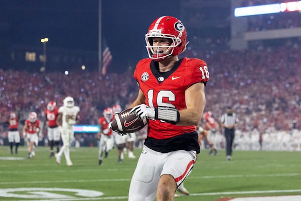 Georgia wide receiver London Humphreys (16) celebrates after scoring a 30-yard touchdown reception during the fourth quarter against Texas in their NCAA football game at Sanford Stadium, Saturday, Nov. 15, 2025, in Athens, Ga. Georgia won 35-10. (Jason Getz/AJC)