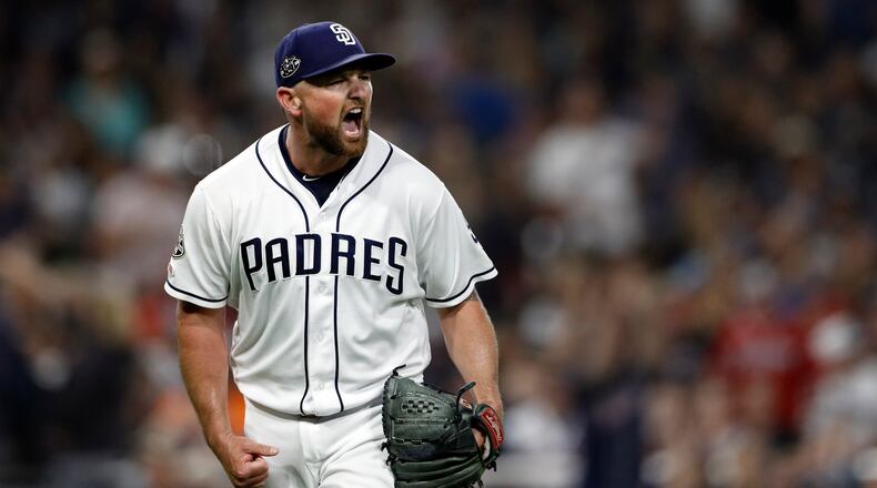 Padres reliever Kirby Yates reacts after striking out Braves star Freddie Freeman during the ninth inning of 2019 game in San Diego.