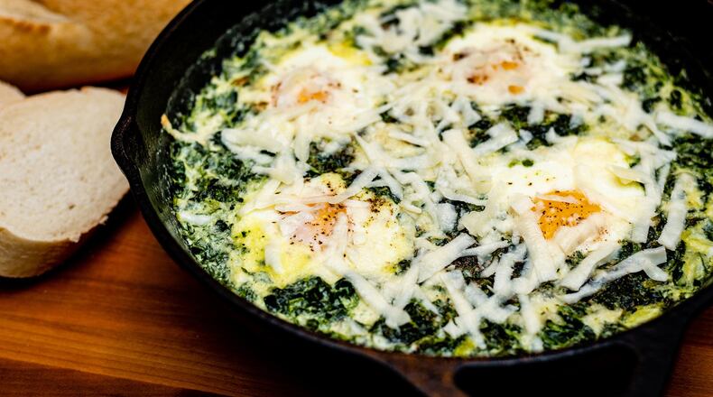 Skillet-baked Eggs with Spinach. CONTRIBUTED BY HENRI HOLLIS