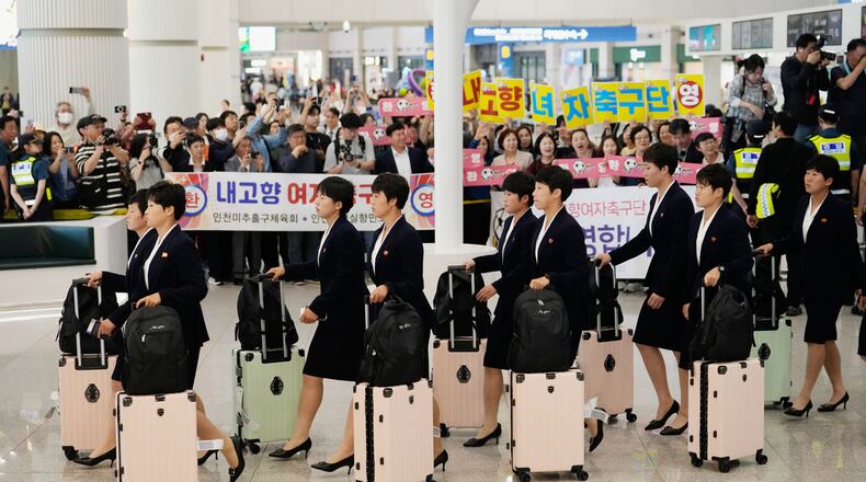 Members of North Korea's soccer club Naegohyang Women's FC team arrives at Incheon International Airpot in Incheon, South Korea, Sunday, May 17, 2026. (AP Photo/Ahn Young-joon)