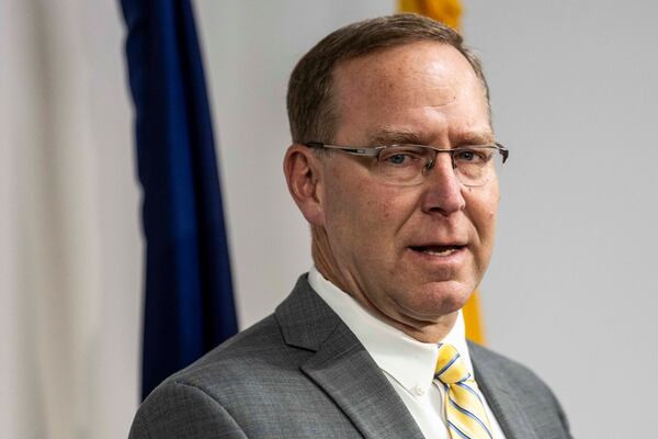 Kent County Prosecutor Chris Becker announces that former Grand Rapids police officer Christopher Schurr who fatally shot a Black man in the back of the head after a tumultuous traffic stop will not face a second trial during a news conference on Thursday, May 22 at the Kent County Administration Building in downtown Grand Rapids. (Isaac Ritchey /The Grand Rapids Press via AP)