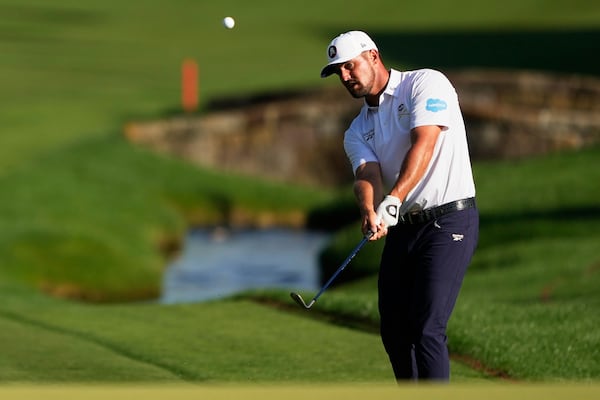 Bryson DeChambeau chips to the green on the 18th hole during the third round of the PGA Championship golf tournament at the Quail Hollow Club, Saturday, May 17, 2025, in Charlotte, N.C. (AP Photo/Matt York)