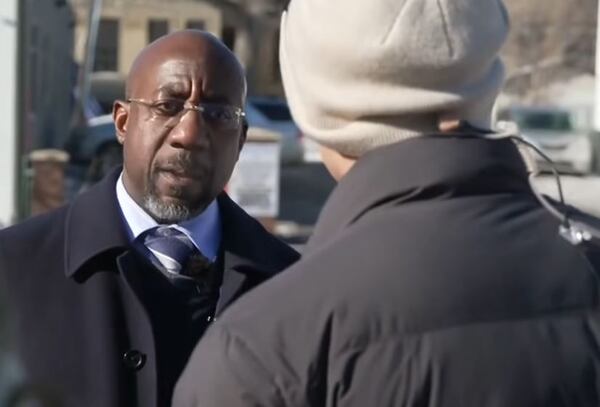 U.S. Sen. Raphael Warnock, D-Ga., on Tuesday visited the memorial site in Minneapolis where federal agents fatally shot a protester a few days earlier. (Screenshot 11Alive)