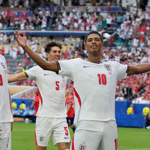 England's Jude Bellingham (right) celebrates next to Harry Kane after scoring his side's second goal against Norway during the World Cup quarterfinal soccer match in Miami Gardens, Fla., Saturday, July 11, 2026. (Lynne Sladky/AP)