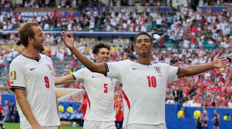 England's Jude Bellingham (right) celebrates next to Harry Kane after scoring his side's second goal against Norway during the World Cup quarterfinal soccer match in Miami Gardens, Fla., Saturday, July 11, 2026. (Lynne Sladky/AP)