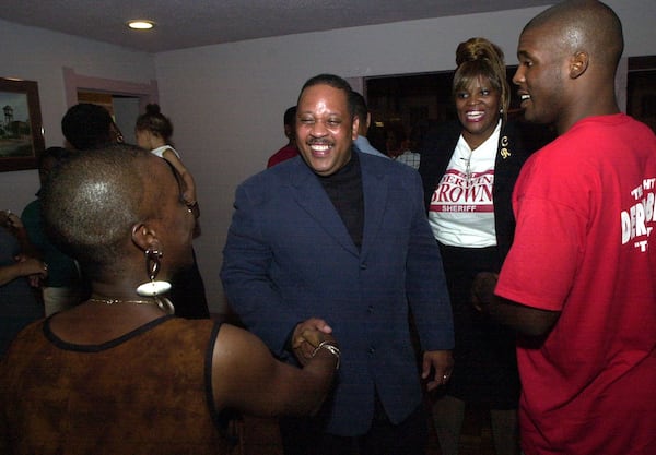 DeKalb County Sheriff-elect Derwin Brown greets well-wishers at his victory party in August 2000. (AJC 2000)