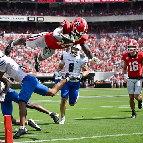 Georgia tight end Elyiss Williams dives into the end zone for a touchdown during the first half in an NCAA football game vs. Tennessee State at Sanford Stadium on Saturday, Sept. 5, 2026, in Athens, Ga. (Hyosub Shin/AJC)