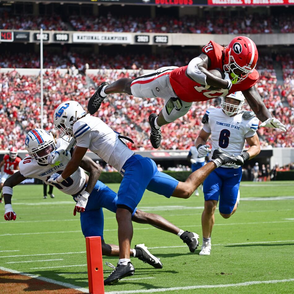 Georgia tight end Elyiss Williams dives into the end zone for a touchdown during the first half in an NCAA football game vs. Tennessee State at Sanford Stadium on Saturday, Sept. 5, 2026, in Athens, Ga. (Hyosub Shin/AJC)