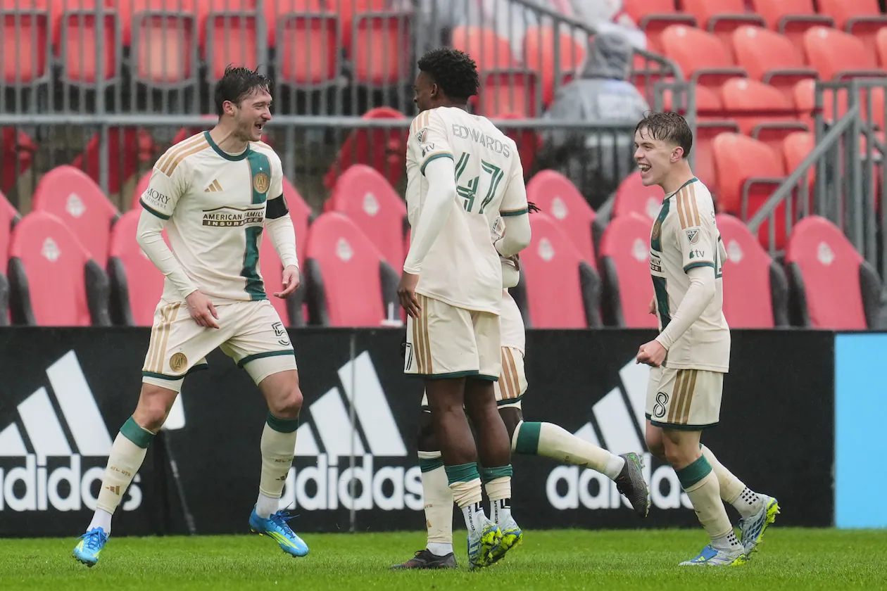 Atlanta United's Alexey Miranchuk (left) celebrates with teammates after scoring a goal against Toronto FC during the second half in Toronto on Saturday, April 25, 2026. (Frank Gunn/The Canadian Press via AP)