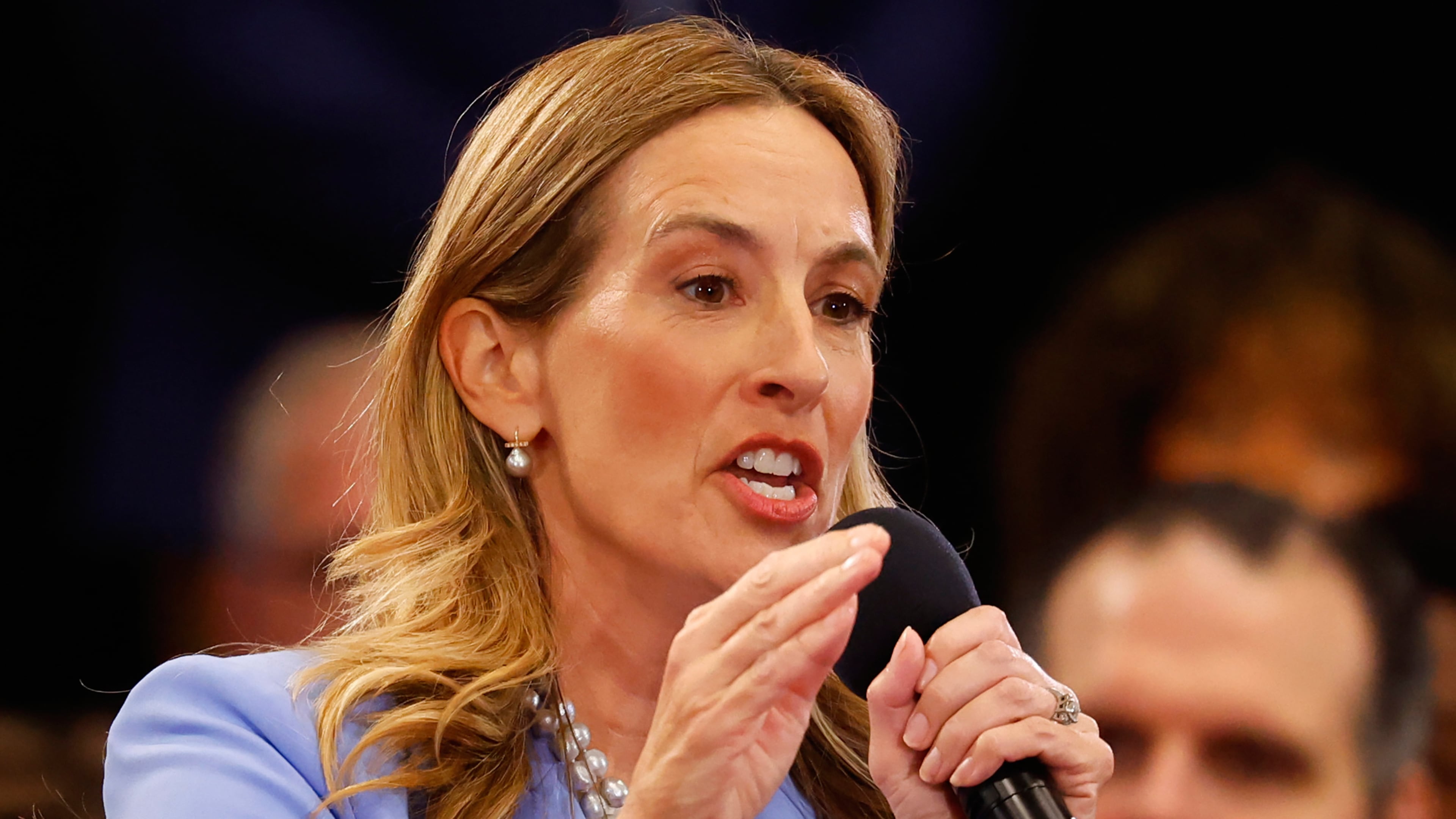 FILE - Democrat Mikie Sherrill responds to questions during the first general election gubernatorial debate with Republican opponent Jack Ciattarelli, Sept. 21, 2025, in Lawrenceville, N.J. (AP Photo/Noah K. Murray, File)
