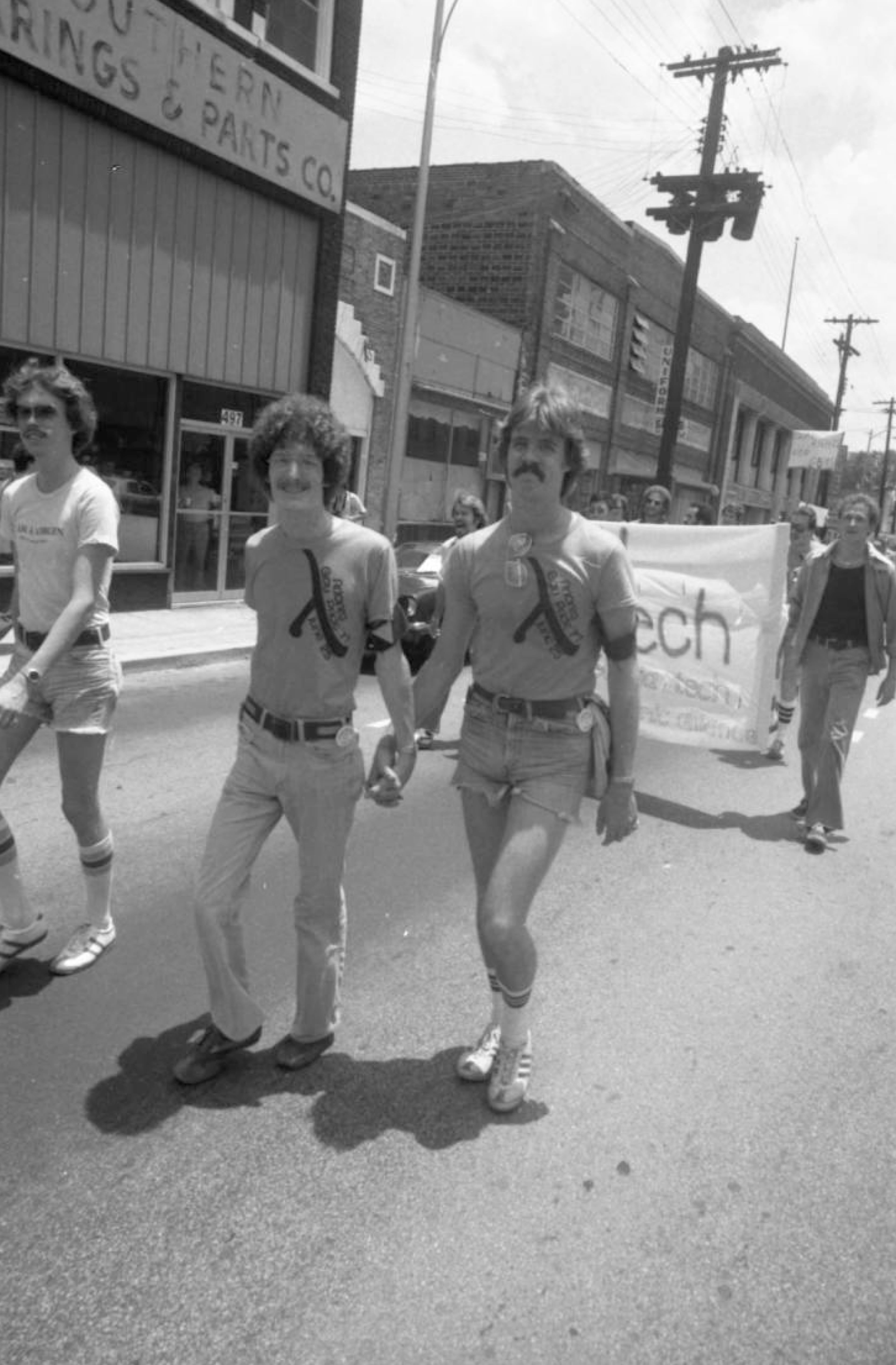 Marchers continue up Peachtree Street during the Atlanta Pride parade on June 25, 1977. (Jerome McClendon / AJC Archive at GSU Library AJCN015-026n)
