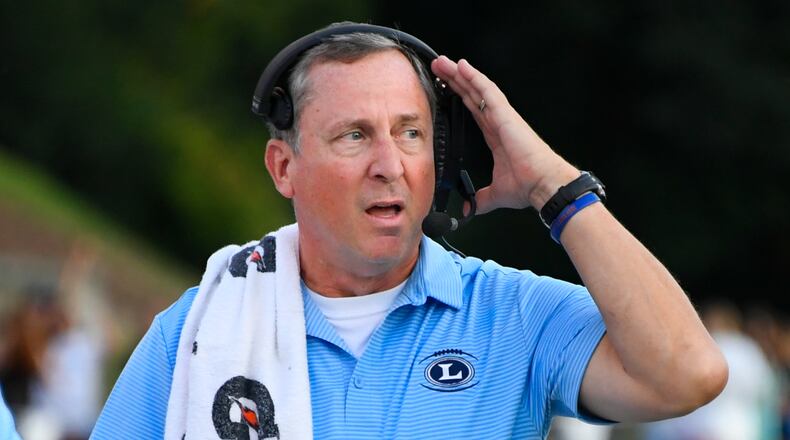 Lovett coach Mike Muschamp works the sideline during a game against Marist. (John Amis/Special)